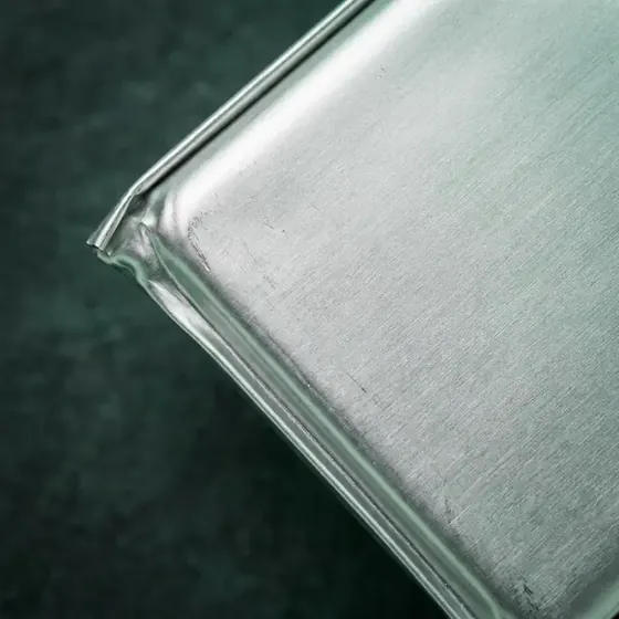 Macro view of a lithium pouch battery cell seam